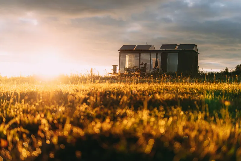 Solar-equipped home in warm evening light